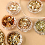 Gold hologram glitter nail art detail